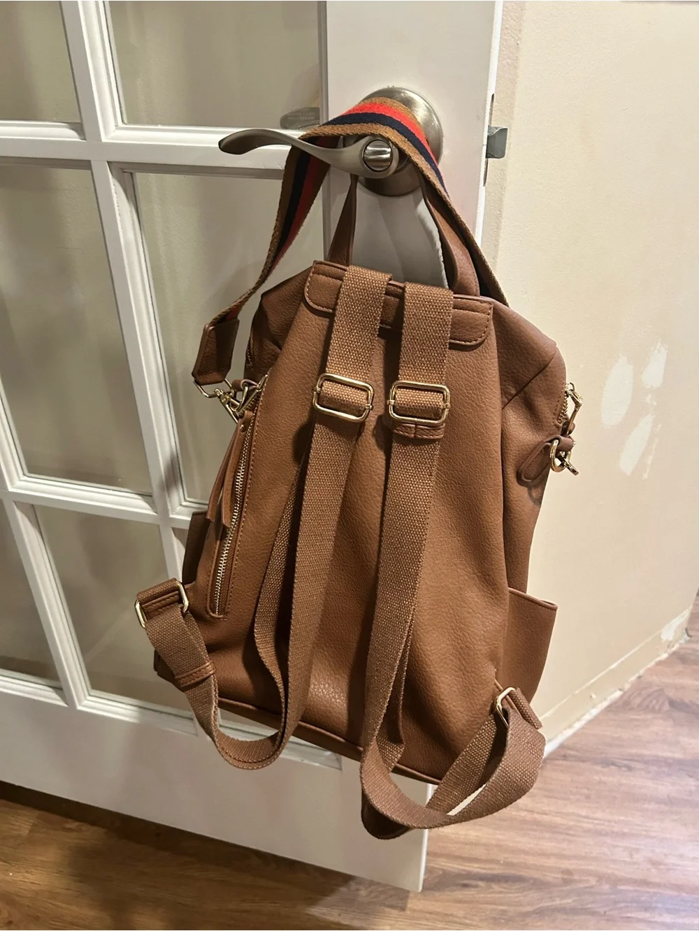 Classic Brown Leather Women's Backpack with Striped Shoulder Strap
